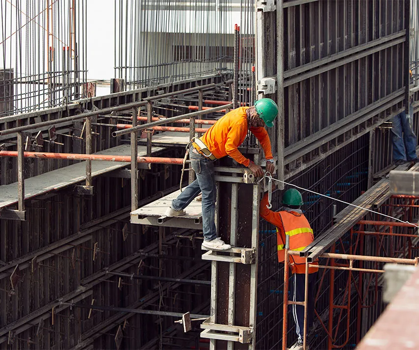 Construction workers working on a building